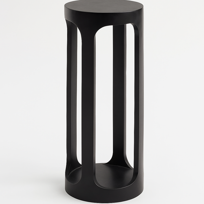 Black cylindrical side table with geometric design on a white background