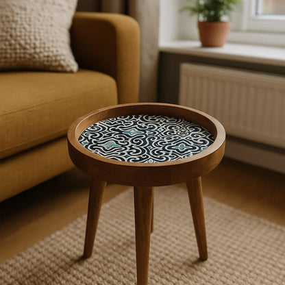 Wooden side table with a patterned top in a living room setting