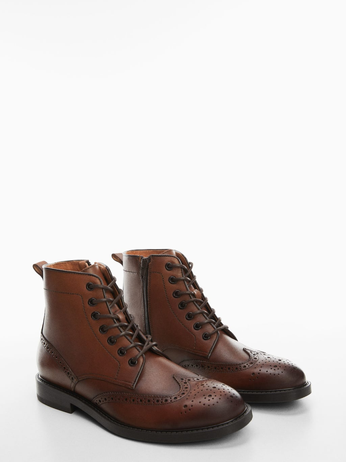 Die-cut leather ankle boots