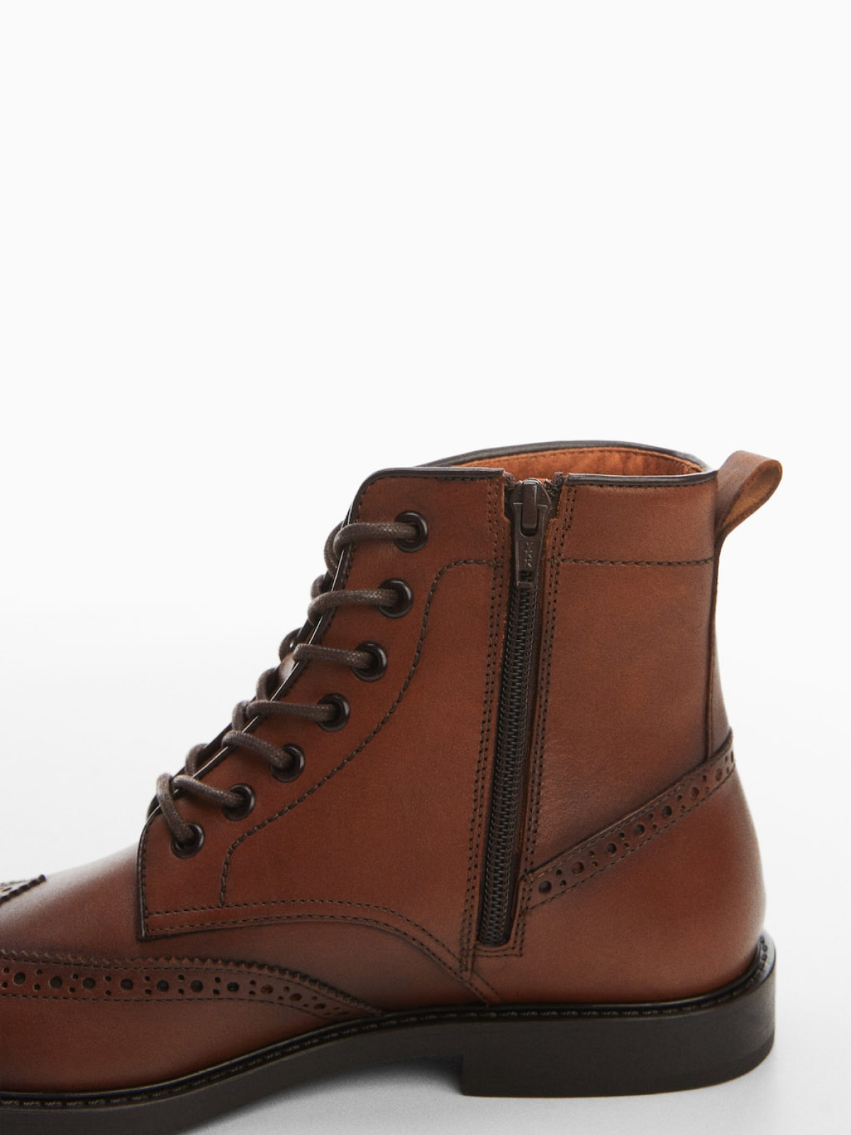 Die-cut leather ankle boots