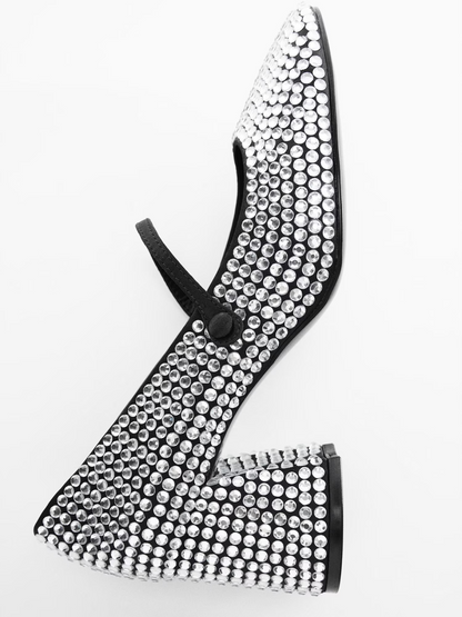 Shoes with shiny heels